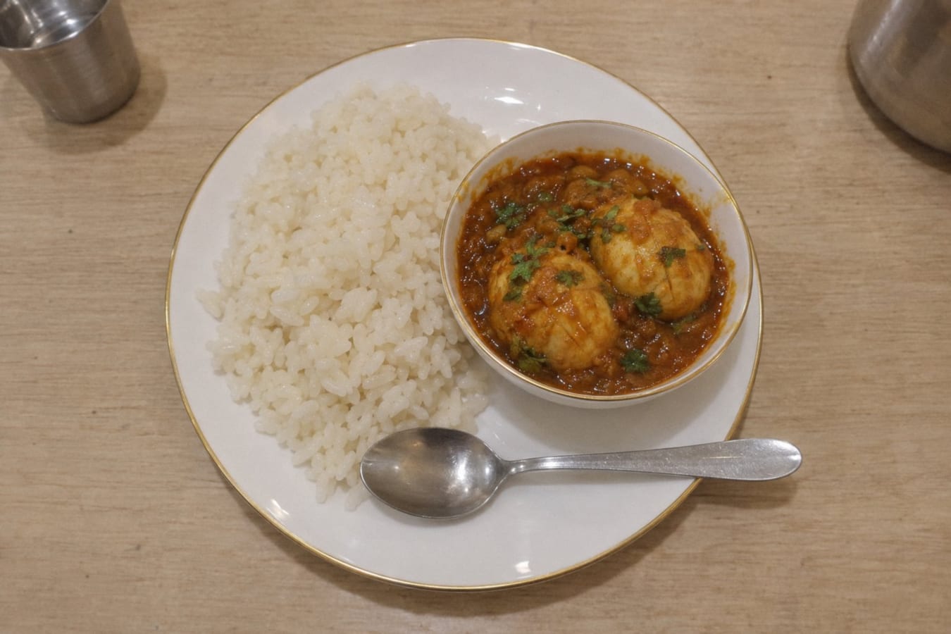 Egg curry with steamed rice