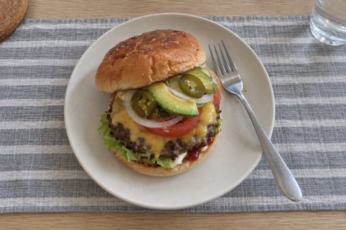 Mexican-style burgers with avocado and pickled jalapeños