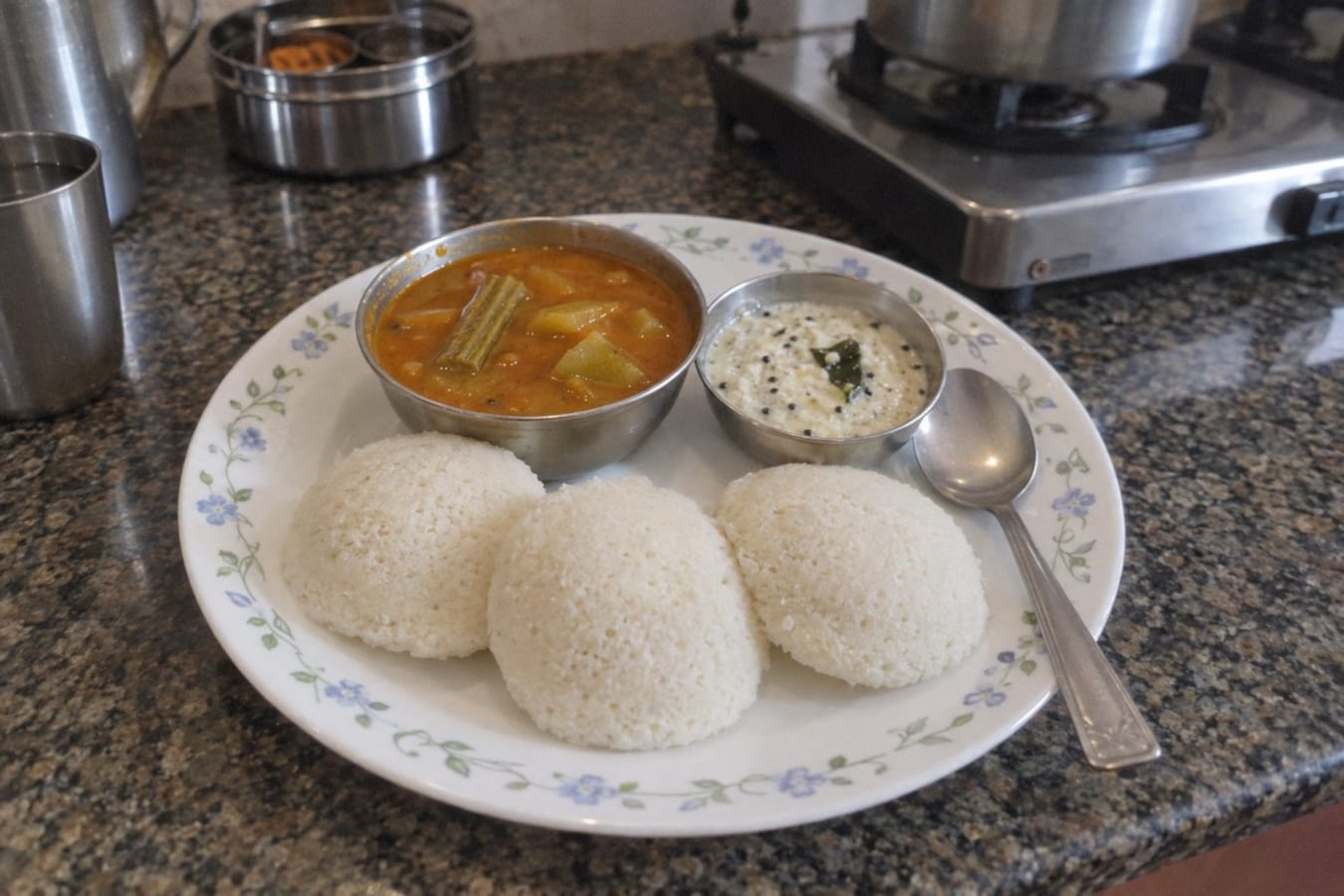 Idli with sambar and coconut chutney