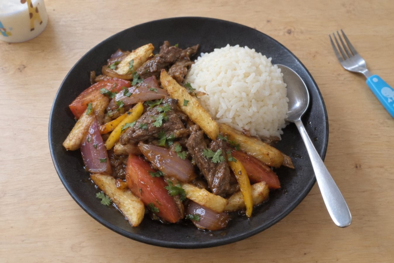 Lomo saltado – Peruvian beef stir-fry with chips and rice