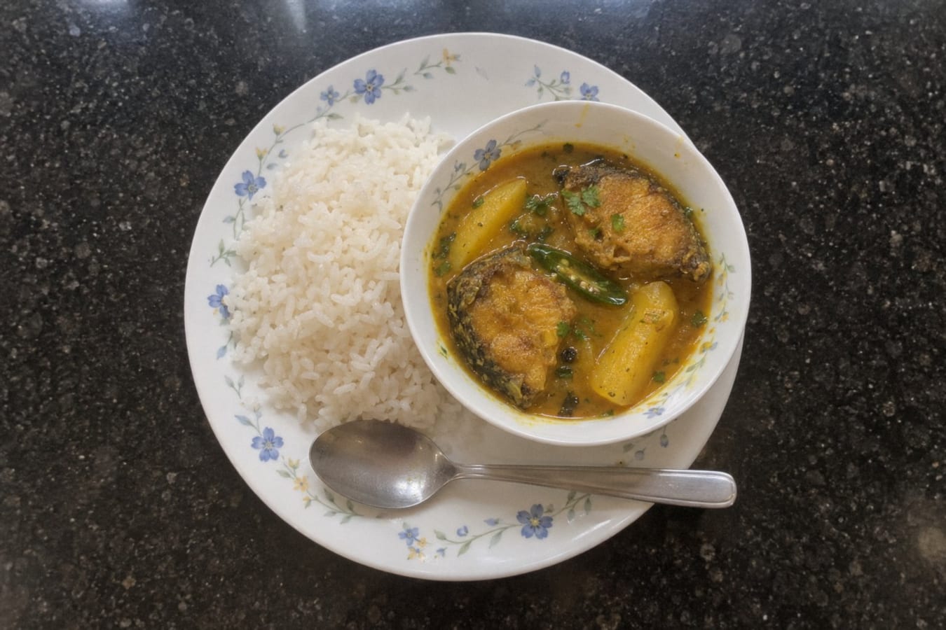 Macher jhol with rice