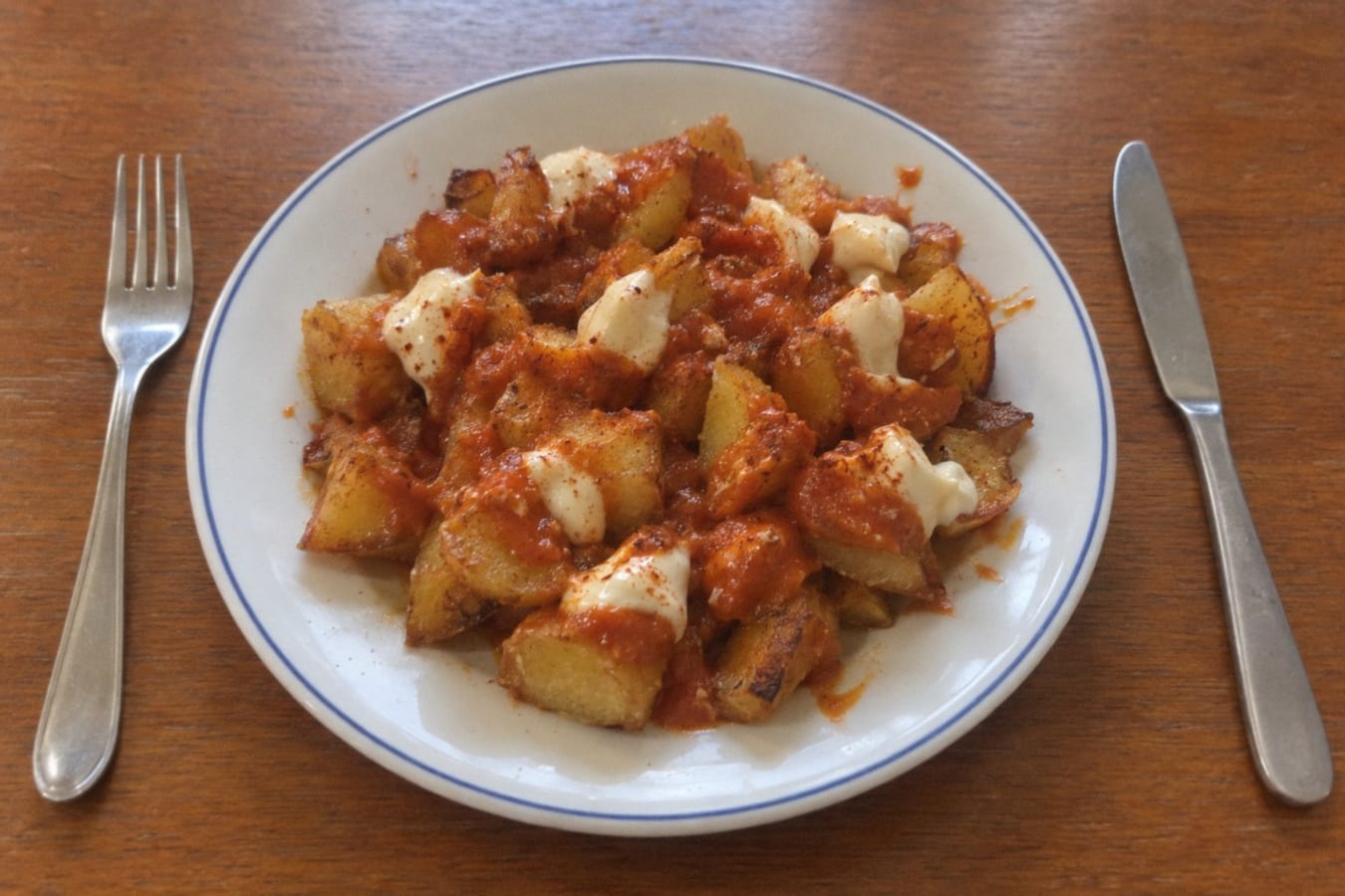 Patatas bravas – fried potatoes with spicy sauce and aioli