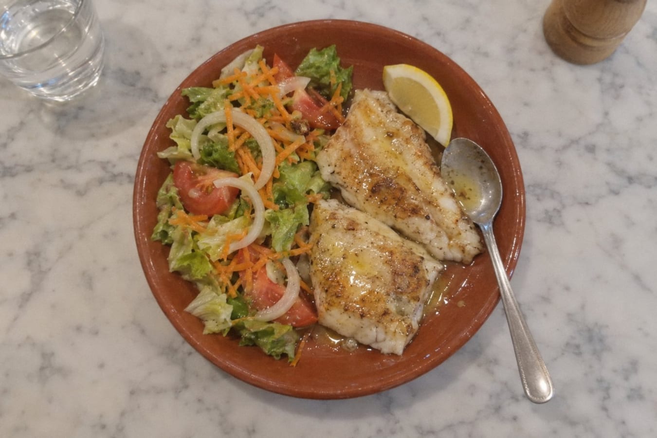 Pan-fried corvina with lemon butter and salad