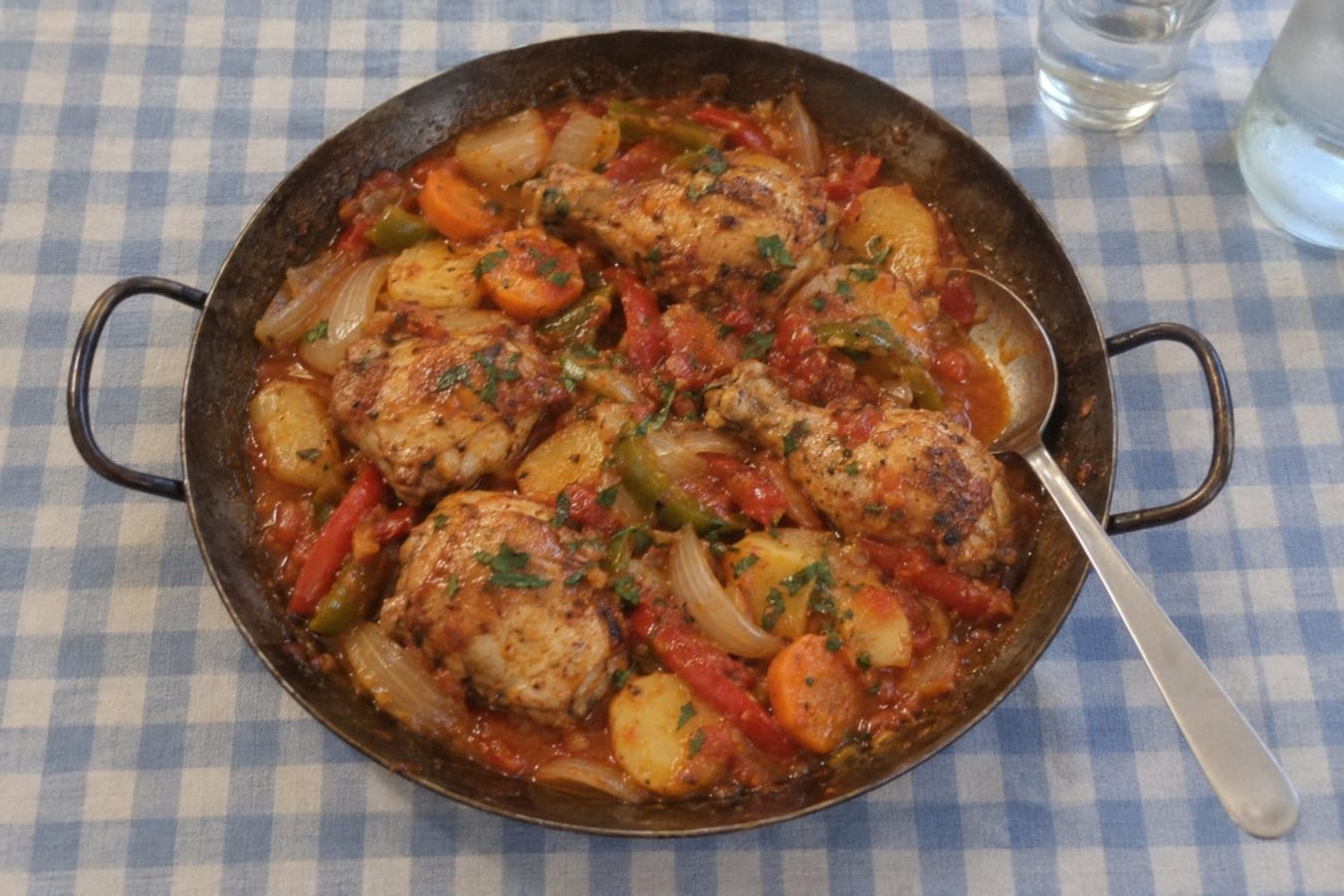 Pollo al disco – chicken cooked in a plough-disc pan over the fire