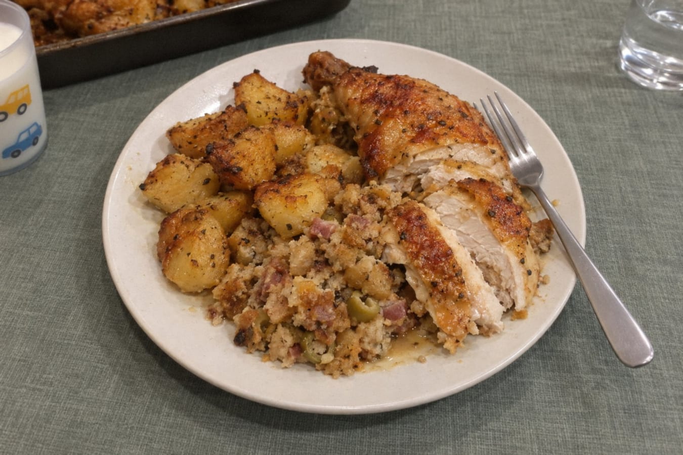 Stuffed roast chicken with potatoes