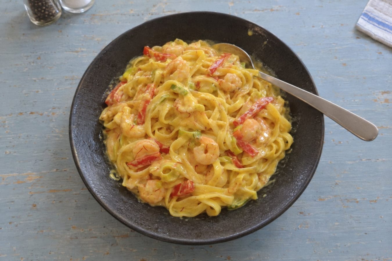Saffron pasta with prawns