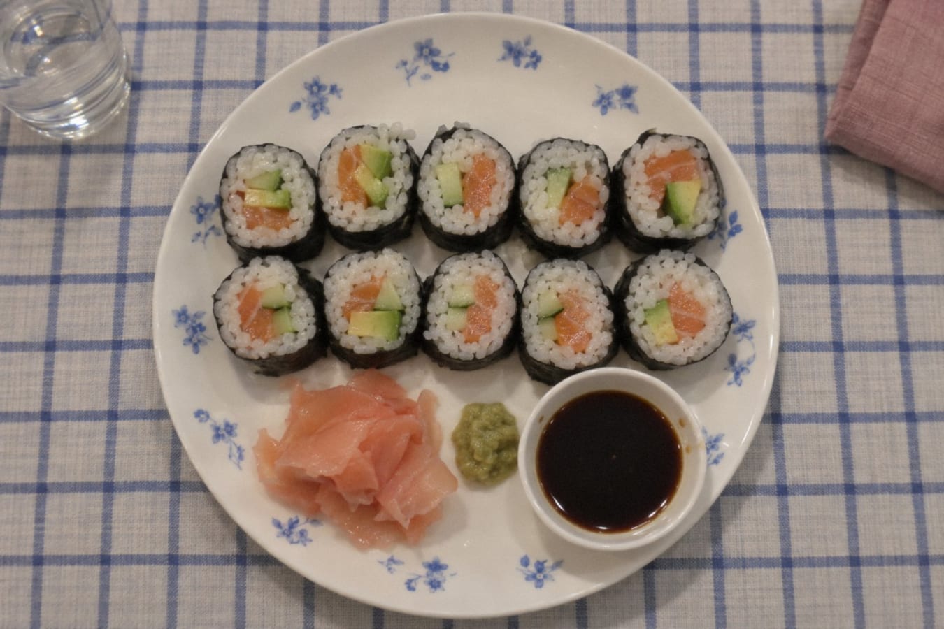 Homemade sushi rolls with salmon and avocado