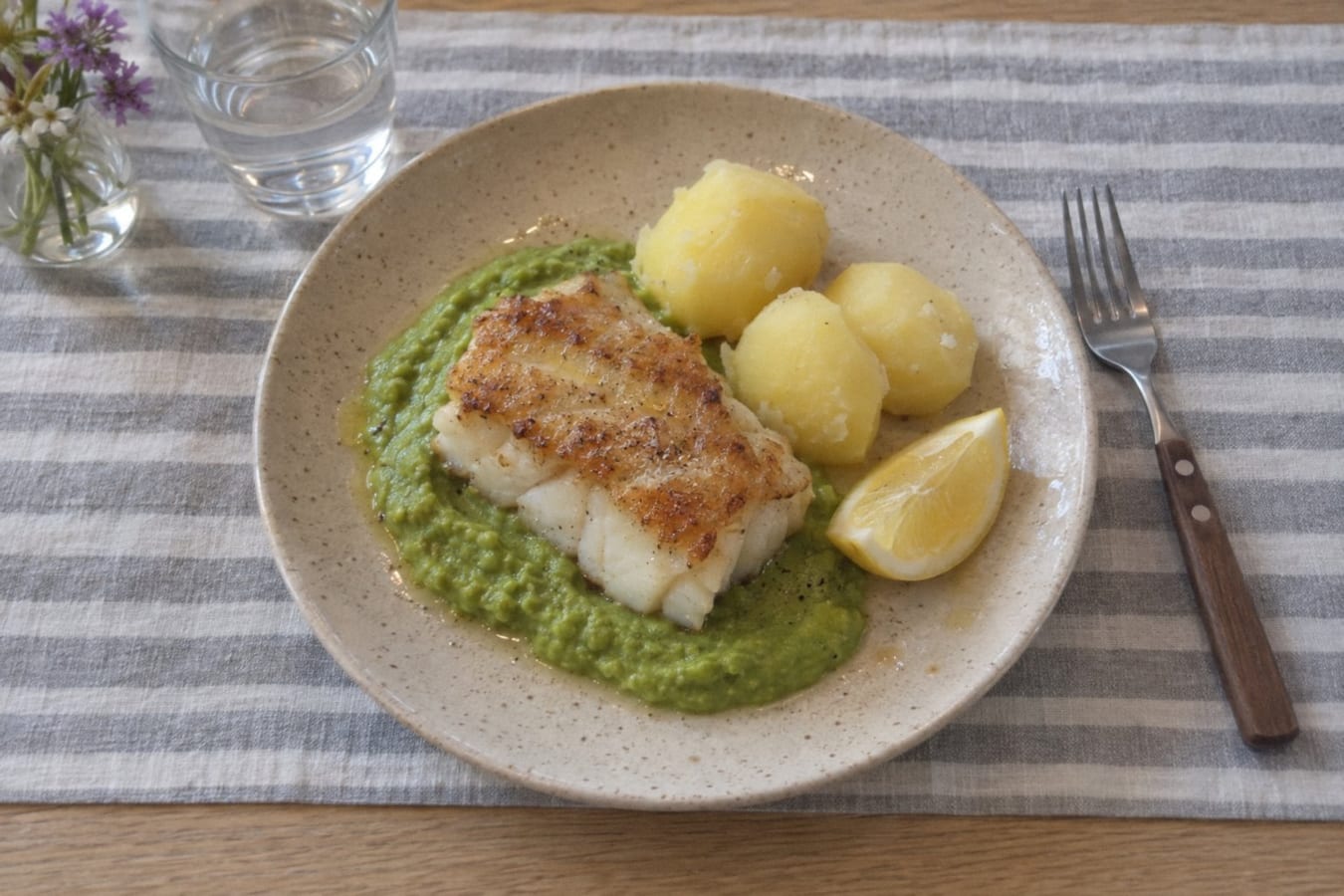 Cod with pea purée, lemon and potatoes