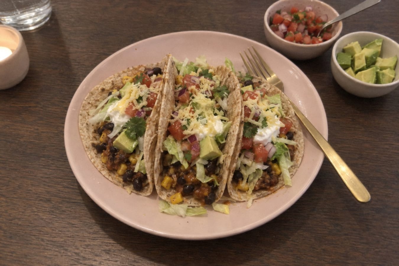 Vegetarian tacos with black beans, sweetcorn and avocado